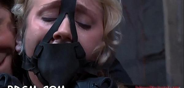  Masked beauty with exposed muff receives wild spanking